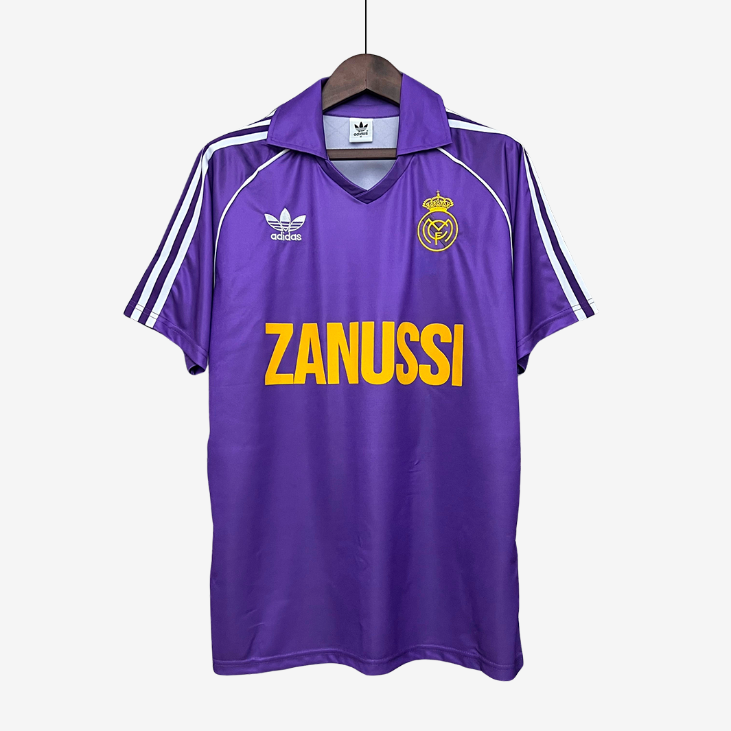 7-52_91cfc4e0-daf4-4edb-b3af-eb13af693e29 Real Madrid 1984/85 Away Jersey – Retro Version - Image 1