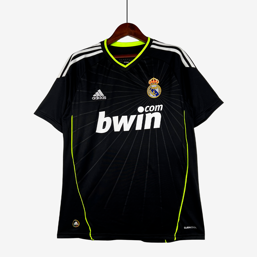 9-44_e1bce794-dd06-4aec-bc12-d1aed5e007fc Real Madrid 2010/11 Away Jersey – Retro Version - Image 1